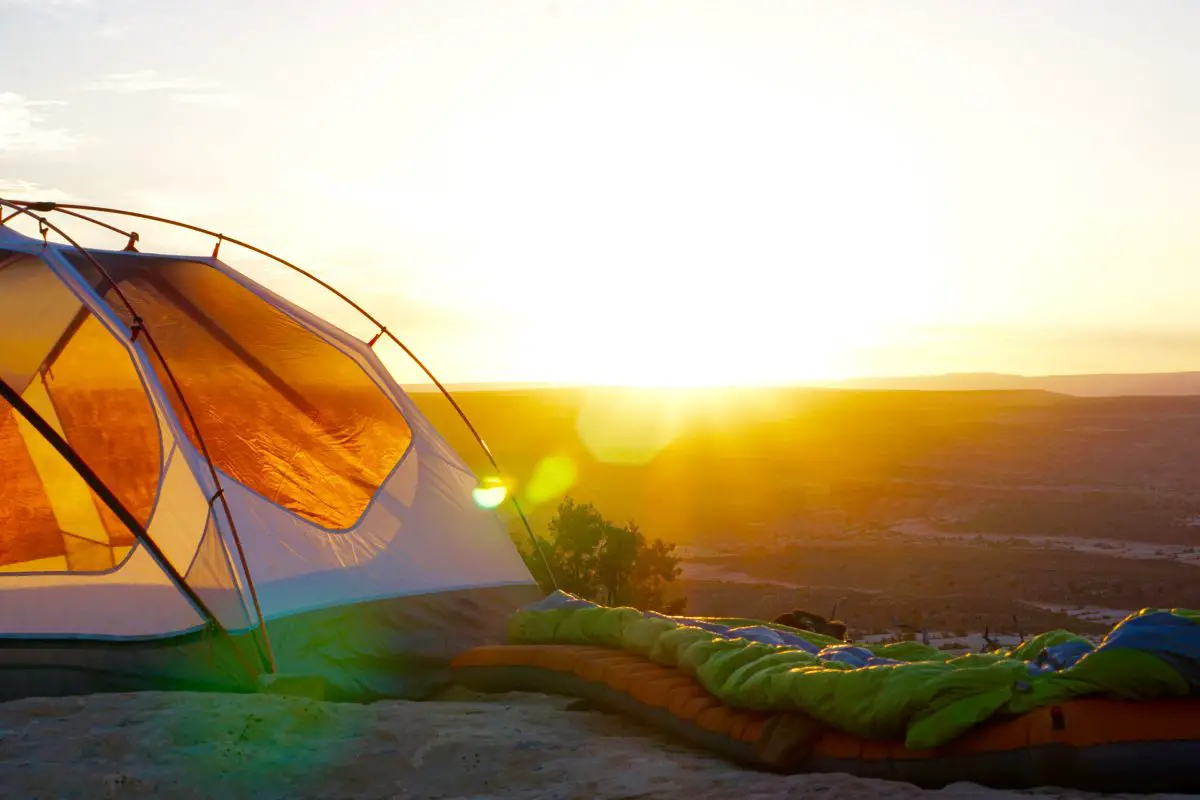 A backpacking tent, sleeping bag and pad - all you need for minimalist camping gear