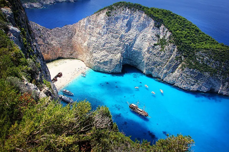 A beautiful Greek Island with a shipwreck on a tourist beach