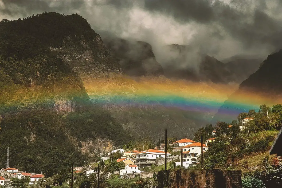 rainbow across town in madeira portugal